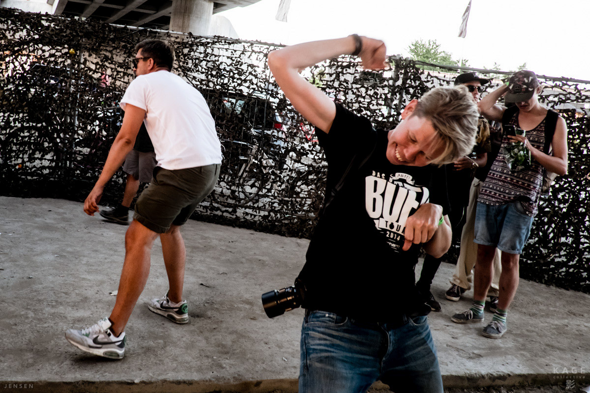 Speaking of working hard, here is yours truly working on some new moves and award winning documentary images at the same time! I'm here to shoot, but when the bass grabs you, you gotta dance! Don't ask me what my wrist is doing. Image by Charlene Winfred.