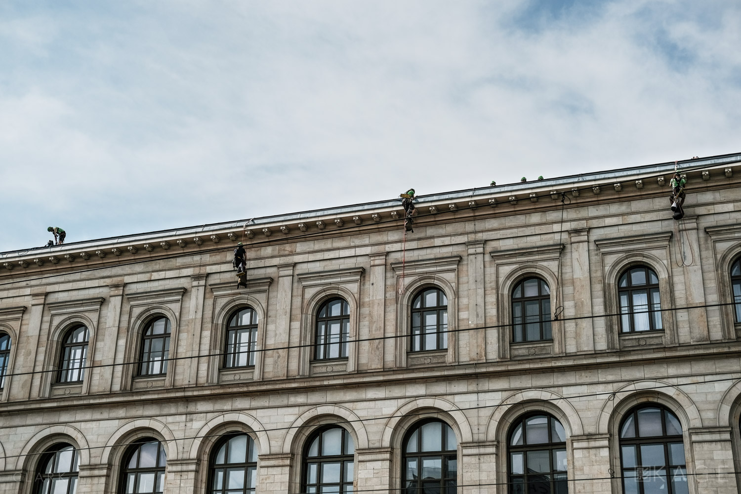 The four Greenpeace protesters make their way back to the roof to face the consequences 