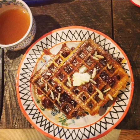 Pumpkin Multigrain Waffles with Apple Cider Syrup, Golden Raisins &amp; Slivered Almonds