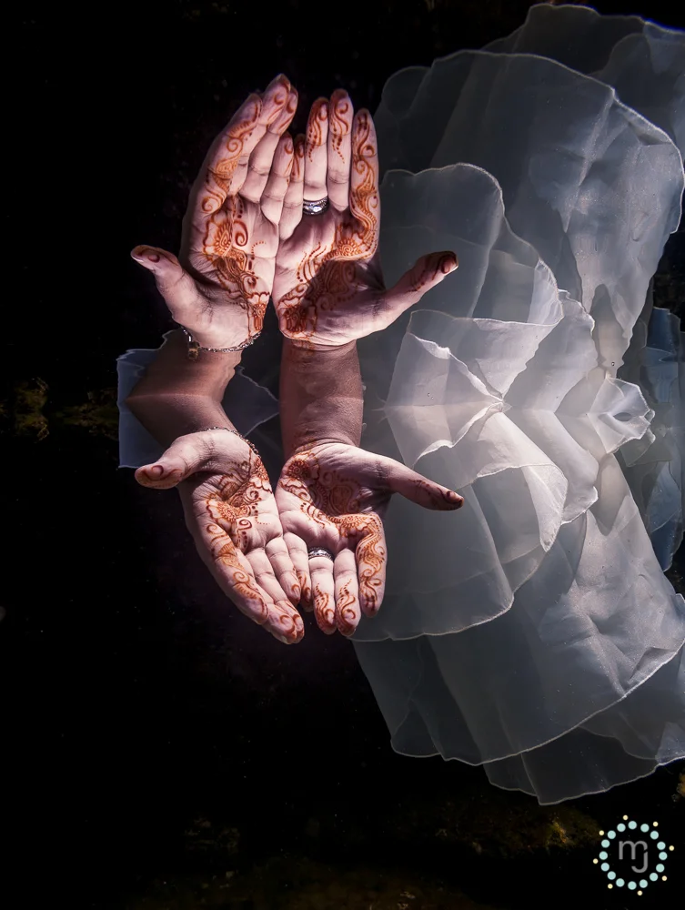 The henna was starting to fade, but still obvious enough to make it into the Trash-the-Dress shoot in one of the Mayan Riviera's crystal clear cenotes! What fun!