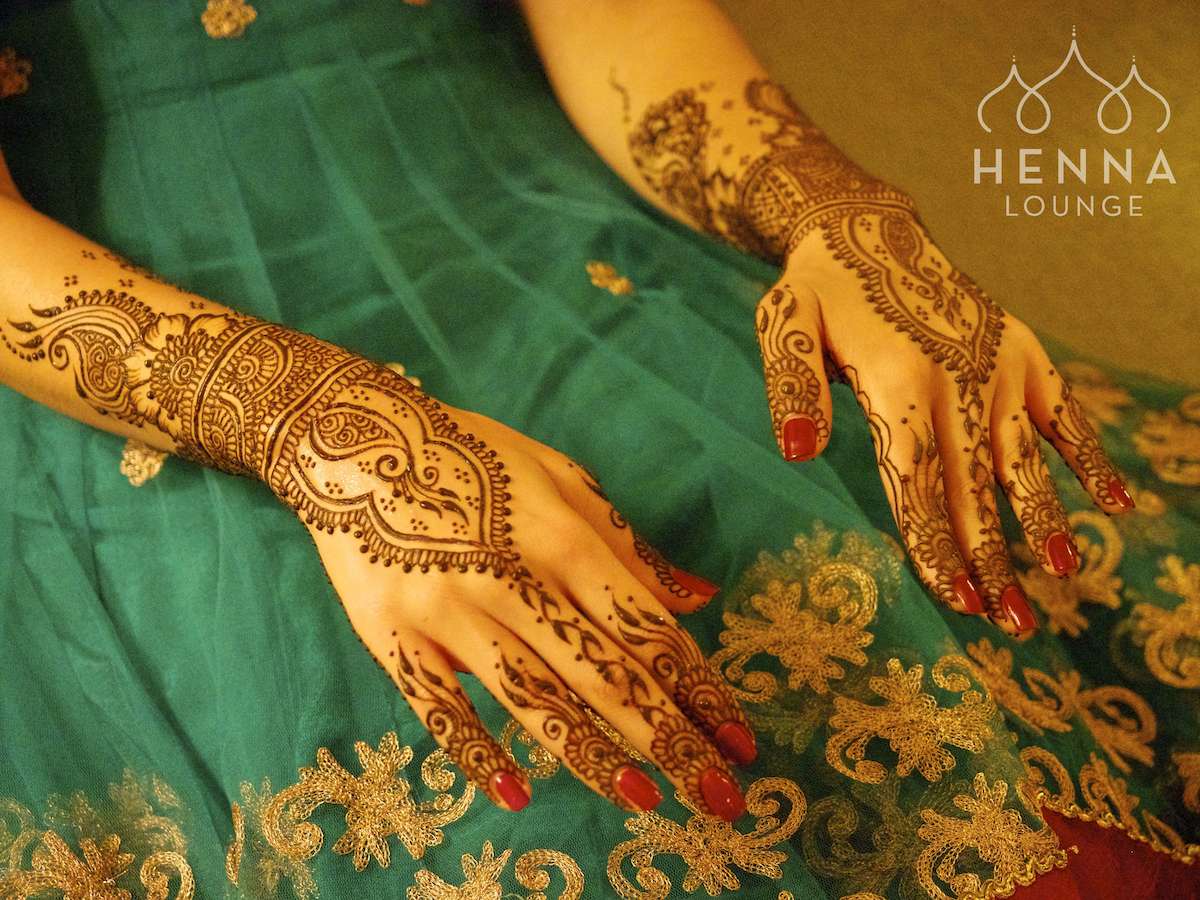 Jewelry-style mehndi for the top of her already graceful hands.
