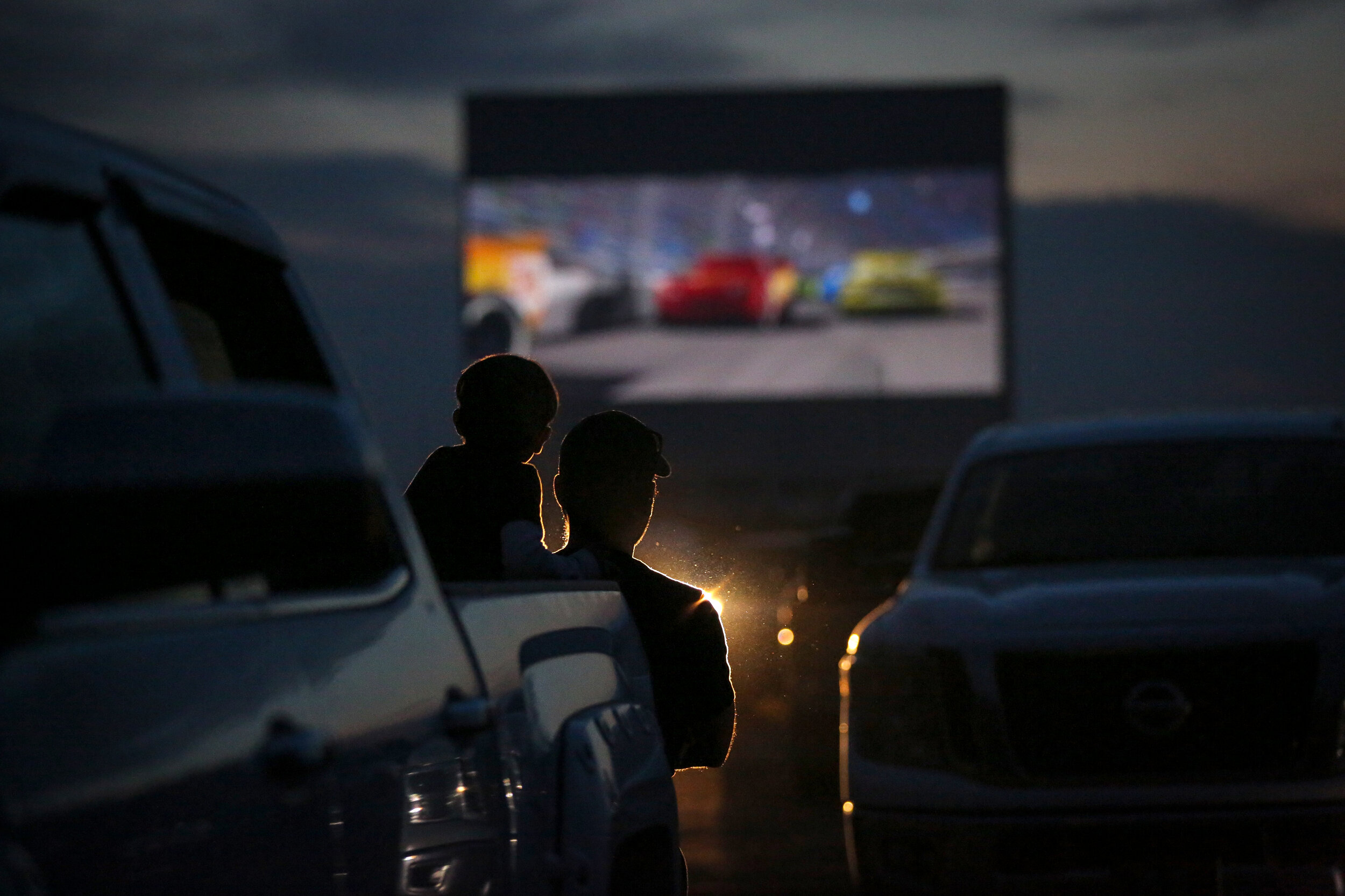 A family watches Cars at the High River Sunset-Drive-In on Friday, August 28, 2020. 