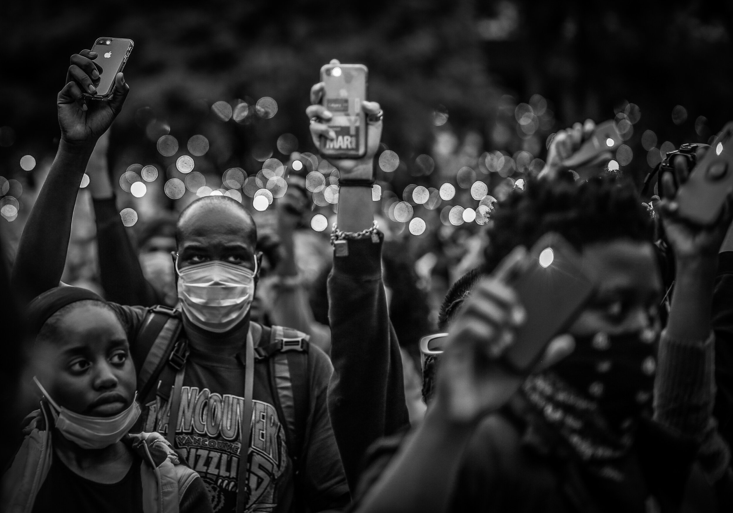  Thousands gather at Olympic plaza in Calgary, Alberta during a Black Lives Matter vigil on June 7, 2020. 