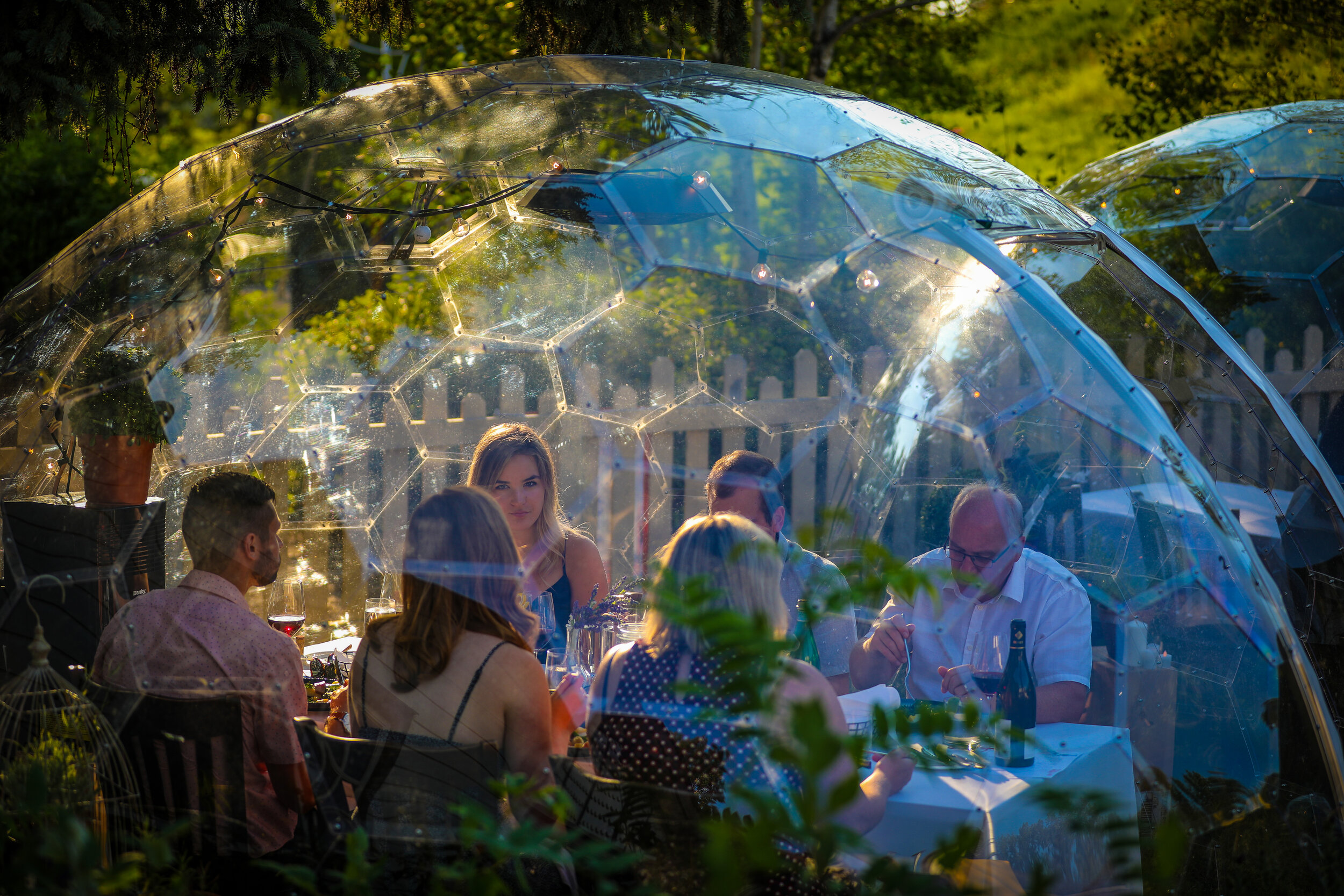  On a day when Alberta recorded 513 new cases of COVID-19, patrons enjoy a meal inside pop-up garden globes at Bow Valley Ranche Restaurant in Calgary, Alberta. 