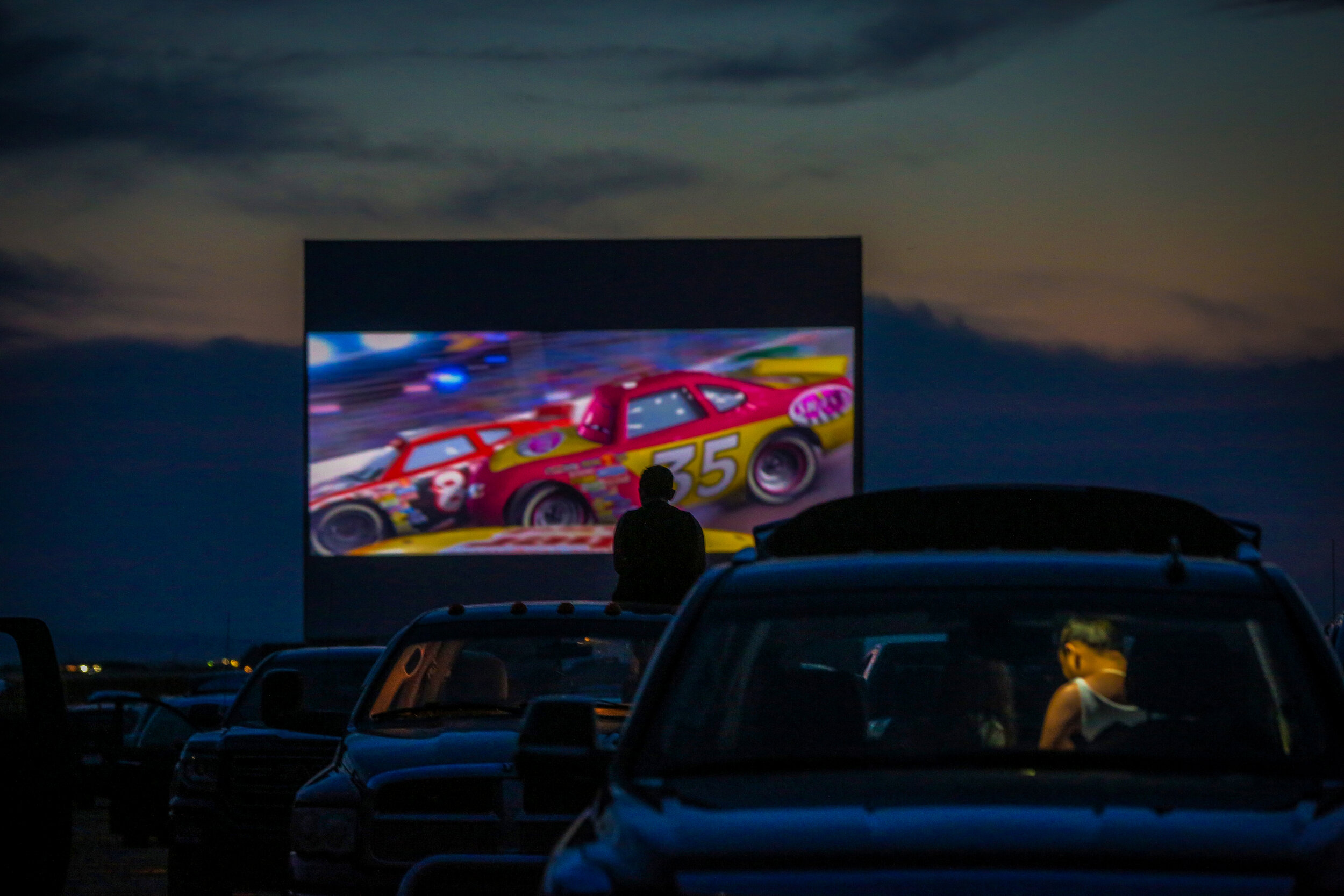  People enjoy watching the movie Cars at the High River Sunset-Drive-In on Friday, August 28, 2020. 