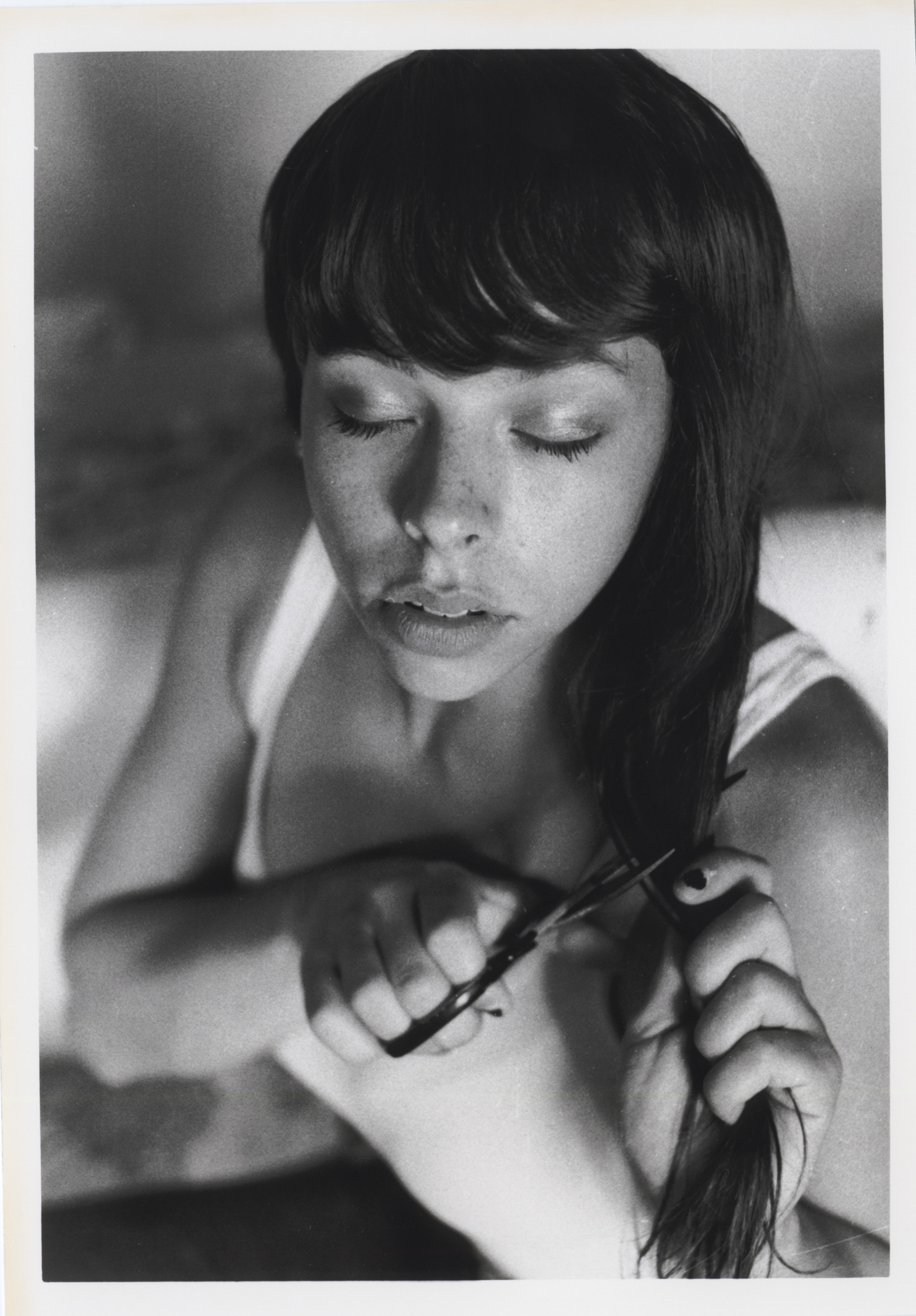 Model: Paige Wolcott Camera: Nikon F100 Film: HP5+ 35mm Photo Paper: Unknown 