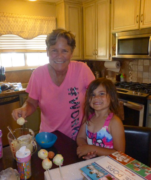 Gigi and Ana made cake pops…very successfully, I might add, thanks to the great “Cake Pops” book we got at a yard sale.
