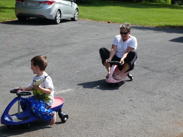 Nathan and Gigi raced on the “plasma cars”, and you can clearly see who won.