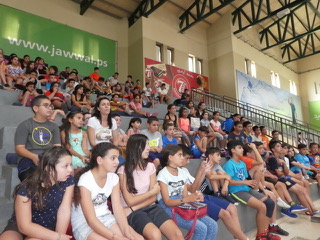 The closing ceremony for the sports camp at the Catholic Action Center.