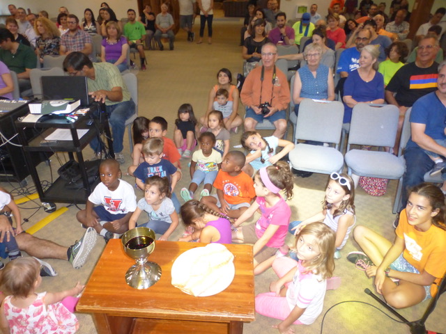 The children gathered for devotions and were very engaged.