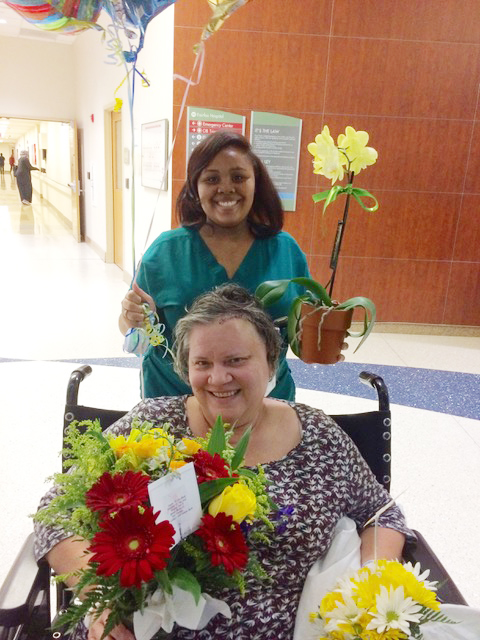 My sister Laura, eleven days after her craniotomy, heads home. SO thankful to even have this photo.