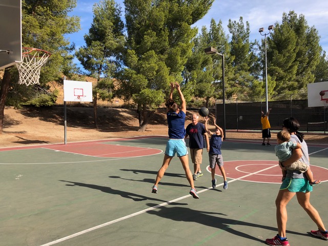 Serious basketball at the park before the Thanksgiving feast.