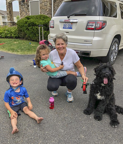 Gigi is about to hop in an Uber for the airport. Farewell in the parking lot to the Johnson crew. :(
