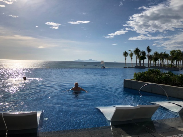 Early morning swim in the infinity pool at the resort in Da Nang, after walking 7 miles on China Beach