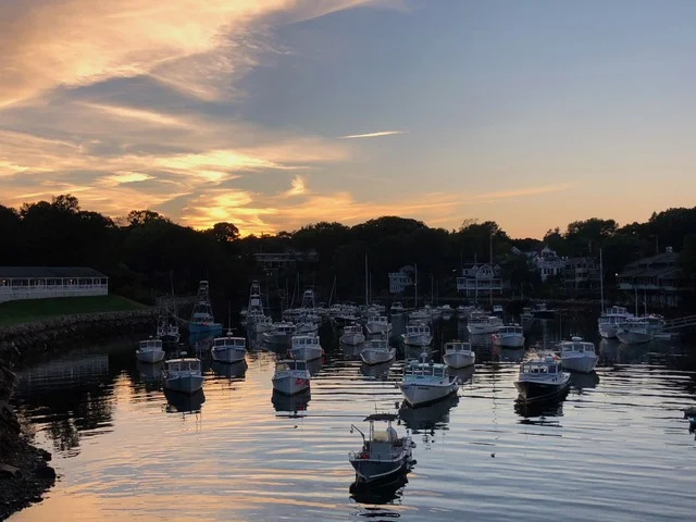 Sunset over the tranquil harbor . . .