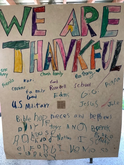 Focusing on giving thanks, everyone contributed their thoughts to the poster designed by Brandon.