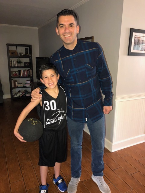 The Coach and his son are ready for Saturday morning basketball.