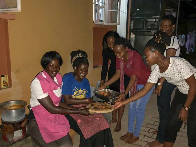Rachel, one of the cooks from CURE, prepared a feast for the couples who gathered at Dr. Emma and Florence’s home.