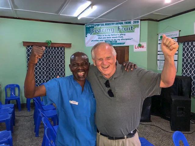 “Mosee” Emma, who has worked at CURE since this hospital opened almost 20 years ago, is Paul’s “brother from another mother.”