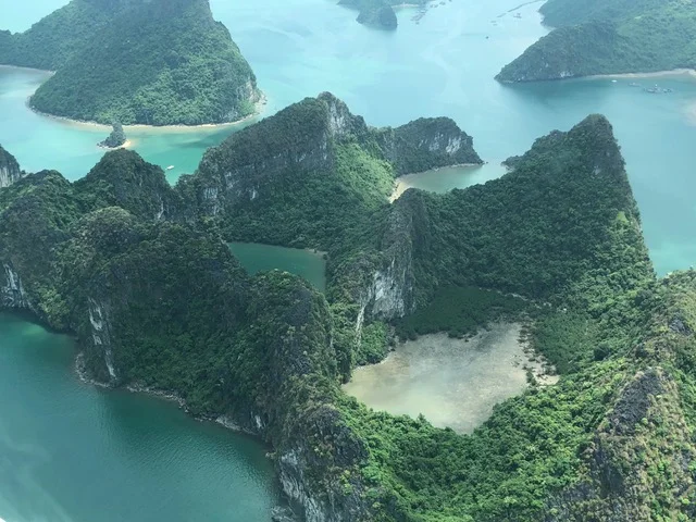 And the next day, when we got our 15-minute aerial tour as we flew back to Hanoi, we saw what we had missed. Spectacular!!