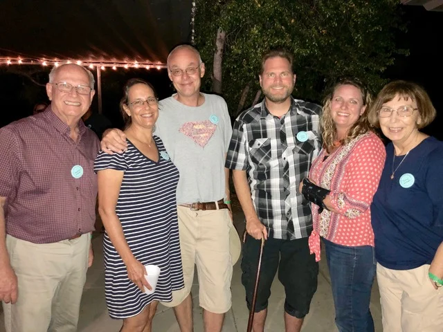 The Sorensens have been coming to family camp since 1977. Marshall and Terrie (flanking the photo) and their daughter Jenny and her husband Steve enjoy connecting with Ken and Kim Johnson at the social.