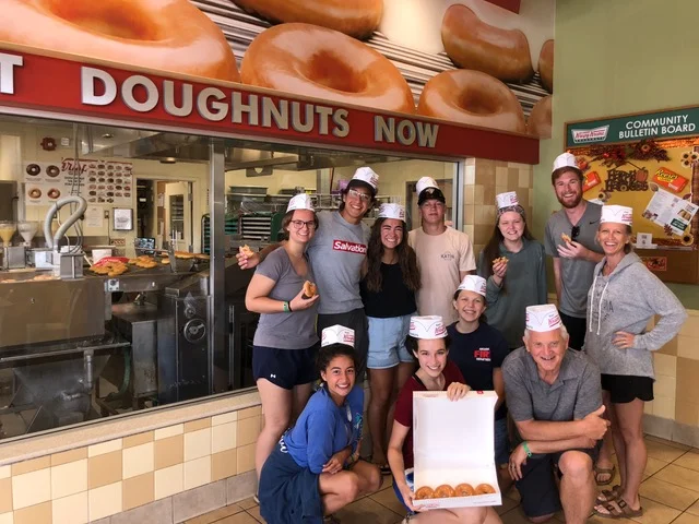 The staff work hard . . . and play hard. On the Wednesday “out of camp” day, we introduced staffer Trinity to her first Krispy Kreme donut, and of course joined her in enjoying these heavenly creations, straight from the vats of fat.