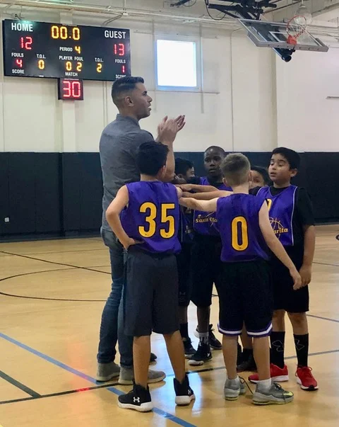 Brandon, #35, listens attentively to his coach (who also happens to be his father). Even though not many wins came their way, it was a season of growth.