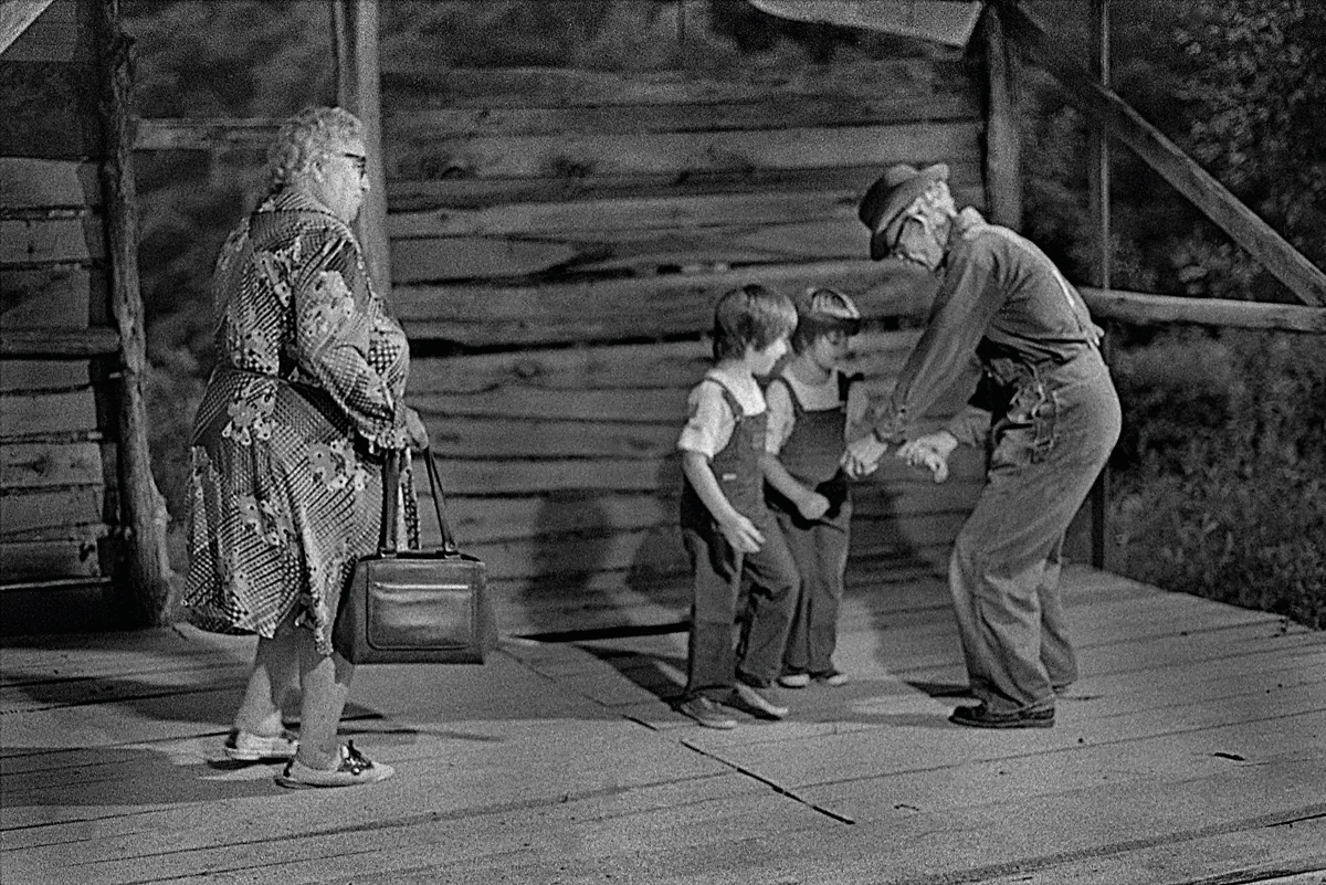 Morris Norton Dancing at the Sodom Music Festival, with Inez Chandler watching, Madison County, NC 1975.