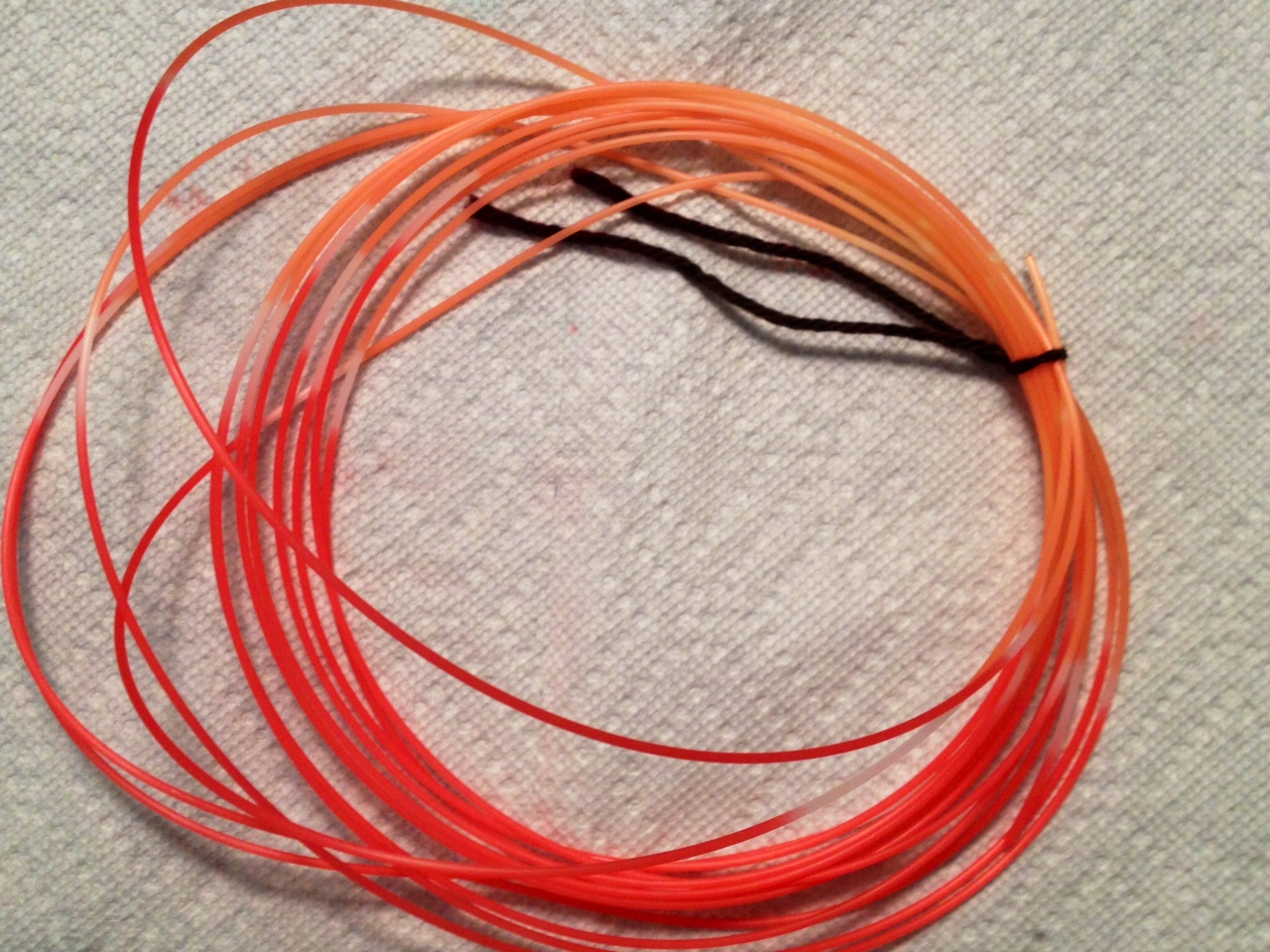 Variegated filament: black cherry on the bottom and orange on top.