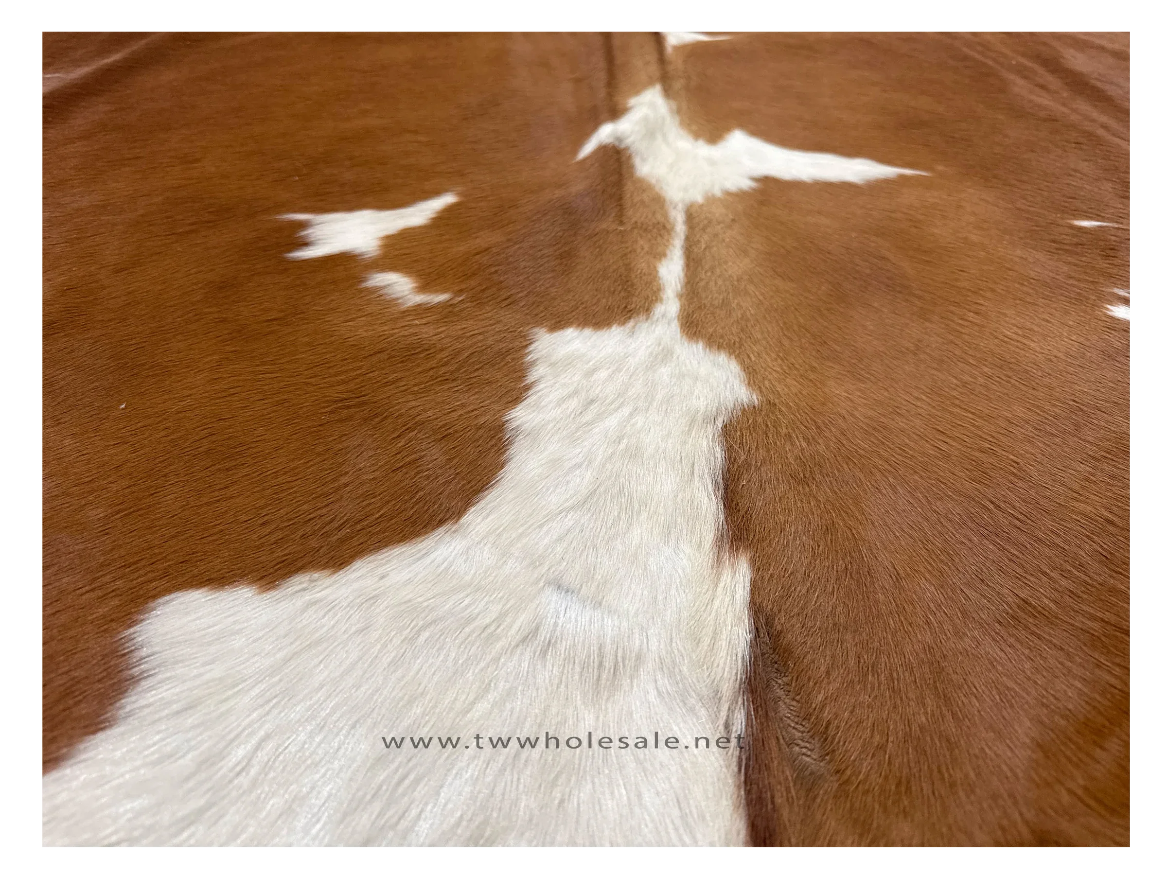 spotted brown white closeup cowhide rug #2015