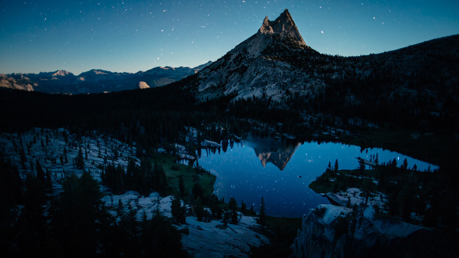 If our entire time in the Range of Light served as the matinee, then this is certainly the feature. Raked with moonlight, Cathedral sits monumentally above Upper Cathedral Lake and the rest of Tuolumne on this clear summer evening. John Muir wrote, “Yonder, to the eastward of our camp grove, stands one of Nature's cathedrals, hewn from the living rock, almost conventional in form, about two thousand feet high, nobly adorned with spires and pinnacles, thrilling under floods of sunshine as if alive like a grovetemple, and well named "Cathedral Peak."