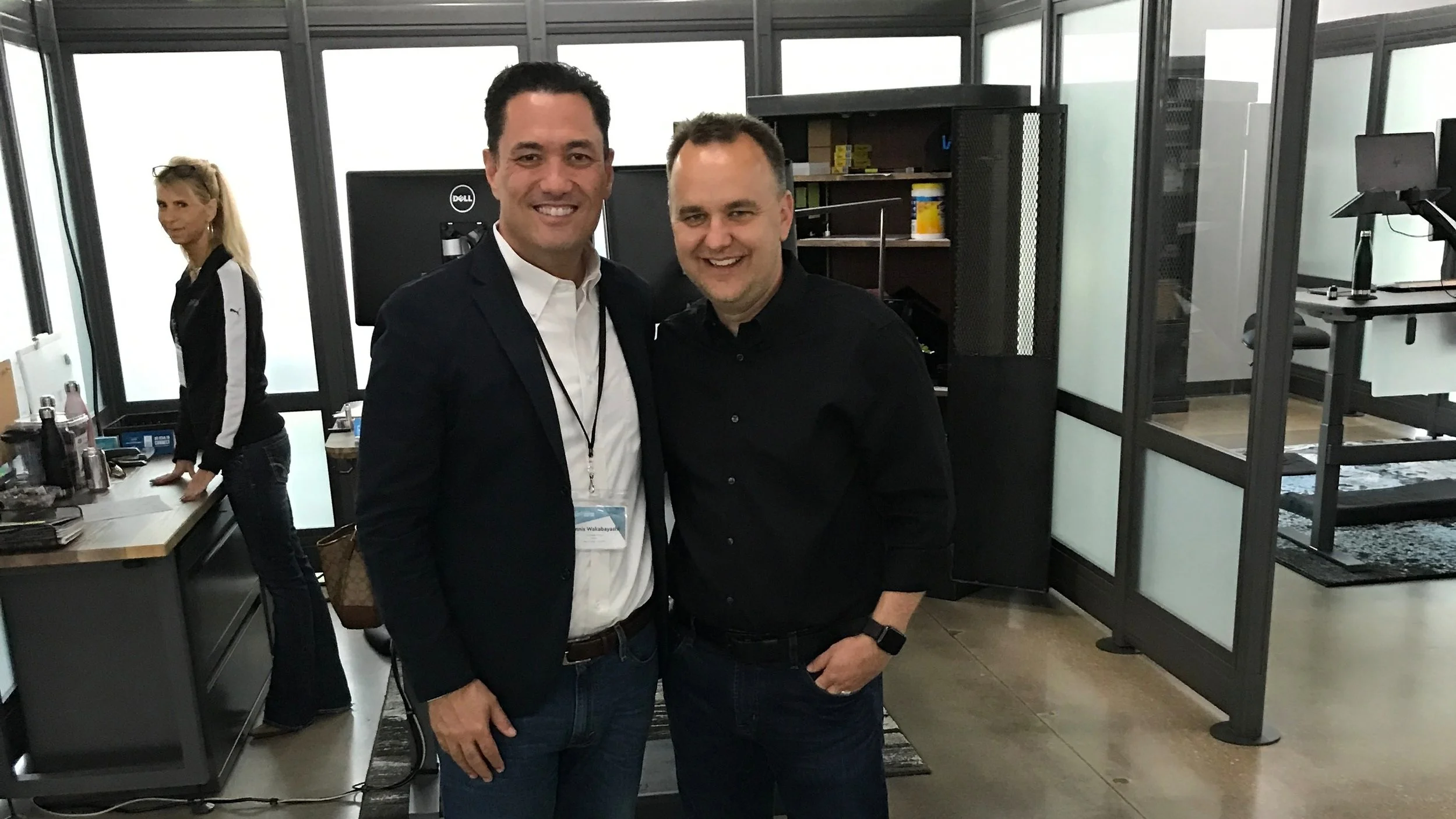 Dennis Wakabayashi on the left and CEO of VARIDESK Jason McCann on the right.