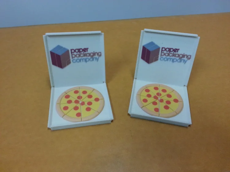 Business card holders &amp; promotional items incorporate company logos and industry themes, all in full-color 3D