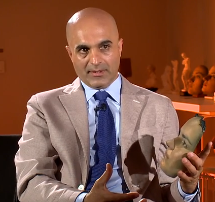 Dr. Avsar holds facial mask (Photo Credit: 3Dprint.com