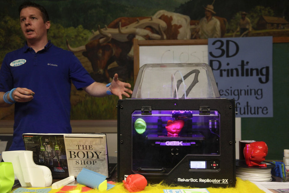 Adam MGee prints 3D heart (photo credit: Oregonian)