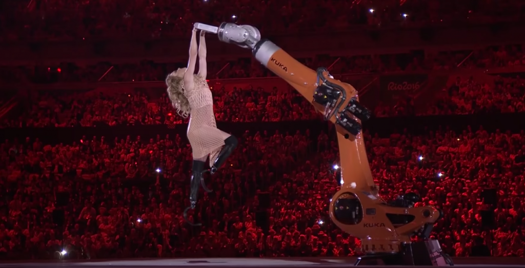 Purdy dances in 3D printed dress with robotic partner (Image Credit: Youtube)