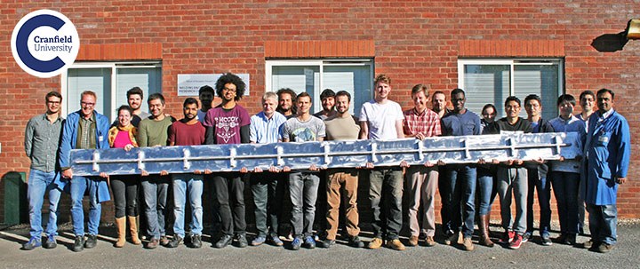 Cranfield graduate students show off largest 3D metal print (photo courtesy of Cranfield University)