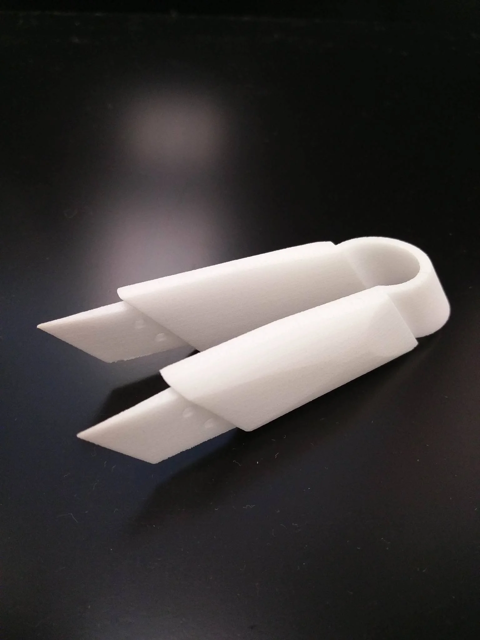 Nylon 3D printed hinge made with selective laser sintering (SLS).