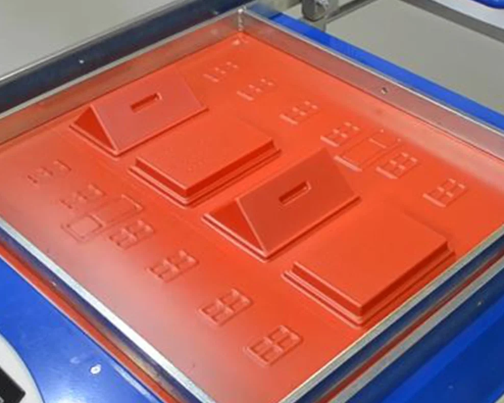 Thermoforming and vacuum forming are excellent technologies for manufacturing plastic panels, housings and displays like the one pictured above.