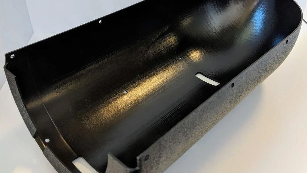 Thermoformed housing for an underwater camera case.