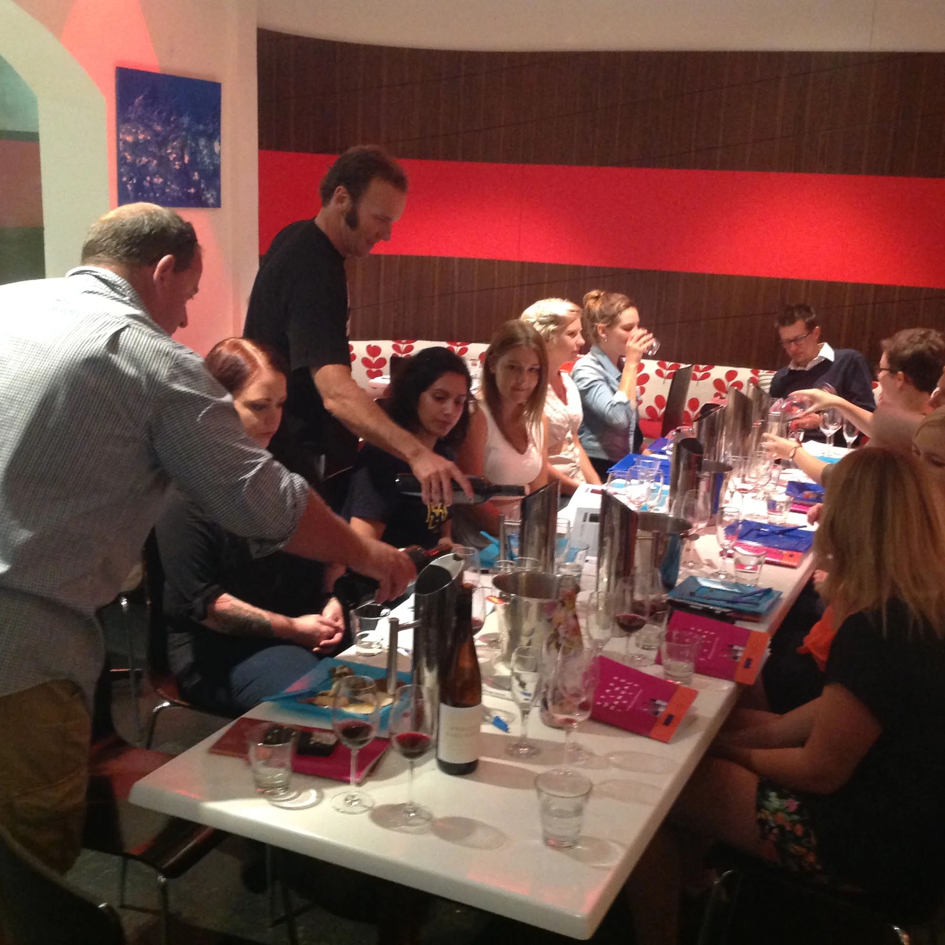 Peter and Phil pouring a 'splash' of wine for us