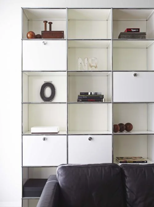 Contemporary, white gloss cabinet that is perfect for storage. (Casey Design/Planning Group Inc. - Photo by Michael Graydon)