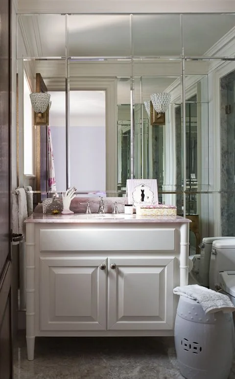 This girl's bathroom is completed with mirrored panels that have hidden storage behind. Any girl's dream come true. (Photo by Ted Yarwood)
