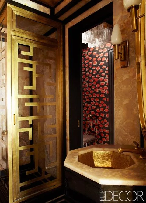 Guest bathroom in Cameron Diaz's home creates "Old World Hollywood" glamour through the use of brass shower stall, sconces and sink. Please invite me! ( Elle Decor ) 
