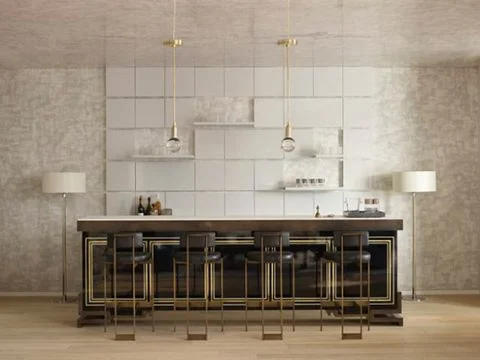 The great opportunity of loft spaces is the height and the chance to create drama, bold statements such as this grand brass and lacquer island. ( Habitually Chic )