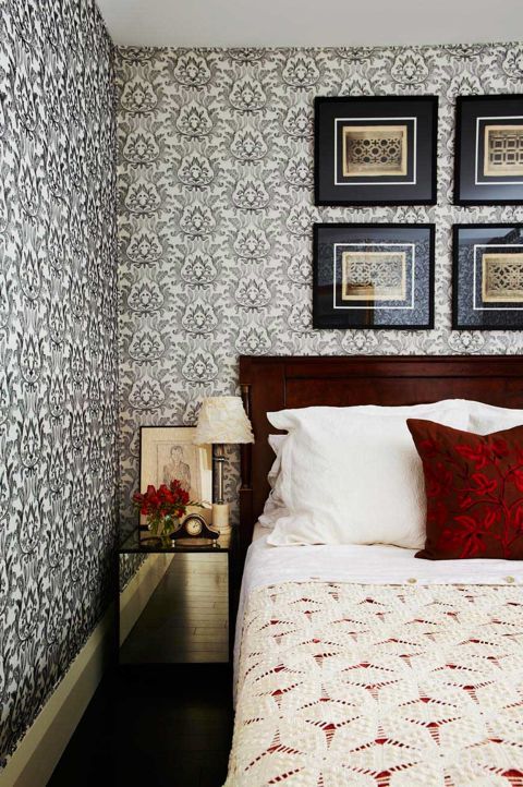 I upholstered our basement guest room walls in black and white silk creating a warm and cozy atmosphere. No one feels hard done by sleeping here! (Casey Design/Planning Group Inc. - Photo by Angus Ferguson)