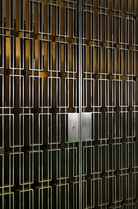 I found this door image with a grill pattern very similar to the ones I used above for my cabinets. Someday I will have my own doors created for a similar affect (this is when a small home becomes a challenge!) ( HomeDSGN )