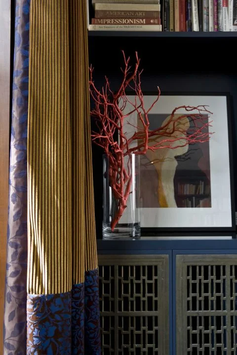 These Art Deco bronze screens were salvaged from the original Toronto Eaton's department store for my own home. A great find, especially since the cabinetry had all ready been built and they fit perfectly! (Casey Design/Planning Group Inc. - Photo by ted Yarwood)