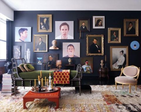 Living room, cozy heaven. Love the portraits! ( Elle Decor ).