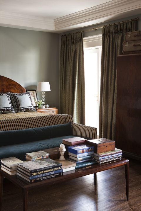 Art deco era master ensuite featuring cozy, striped settee (Casey Design/Planning Group Inc. - Photo by Ted Yarwood).